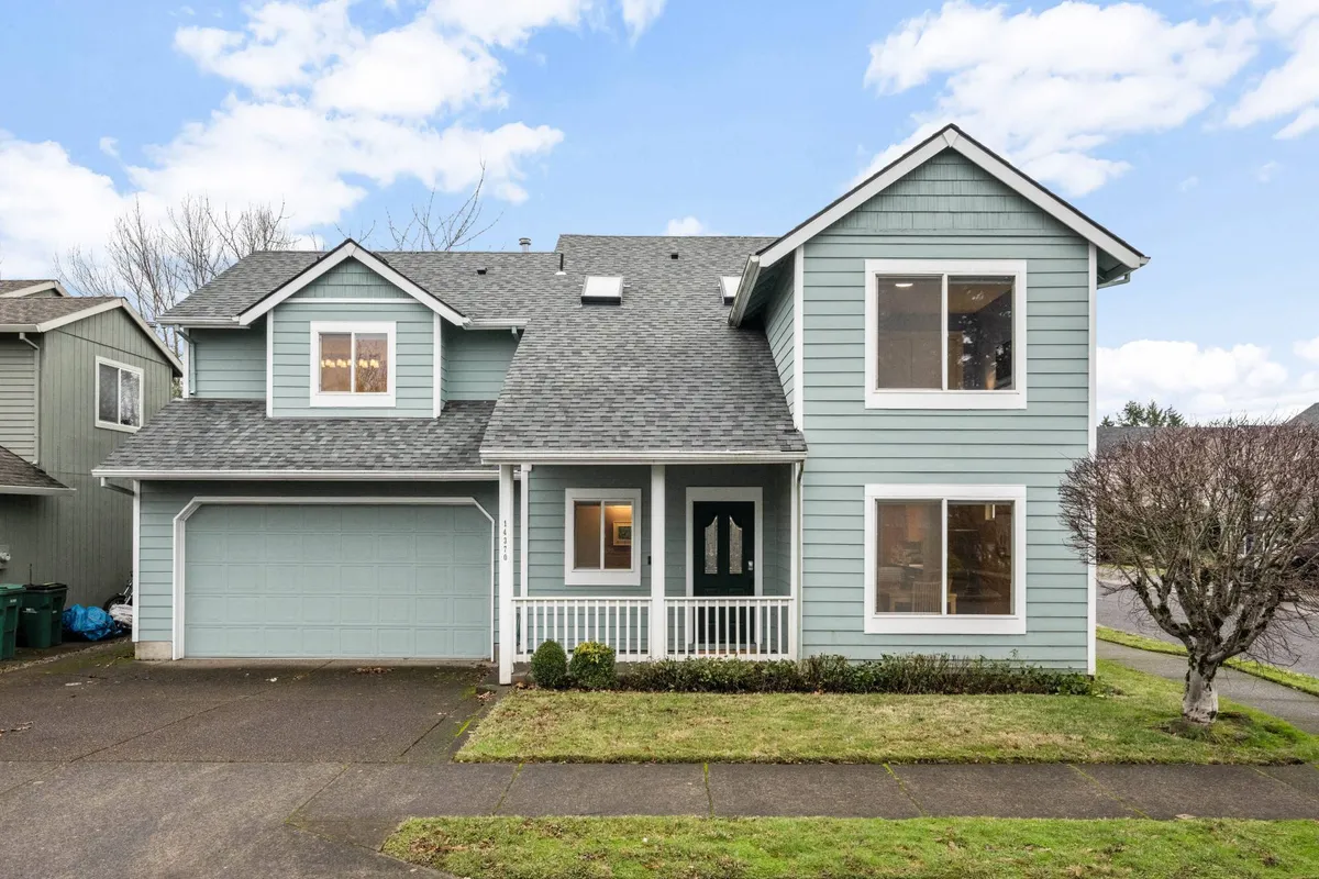 The hero image showcases a charming single-family house with a welcoming front porch, large sunlit windows, an eye-catching asymmetrical roofline, and a beautifully landscaped yard. The setting is bright and inviting, evoking feelings of warmth, comfort, and the potential for family activities like relaxing on the porch or playing in the yard.